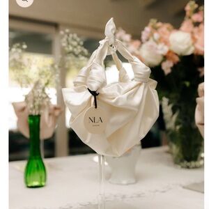 Ivory NLA Silk Knot Bag